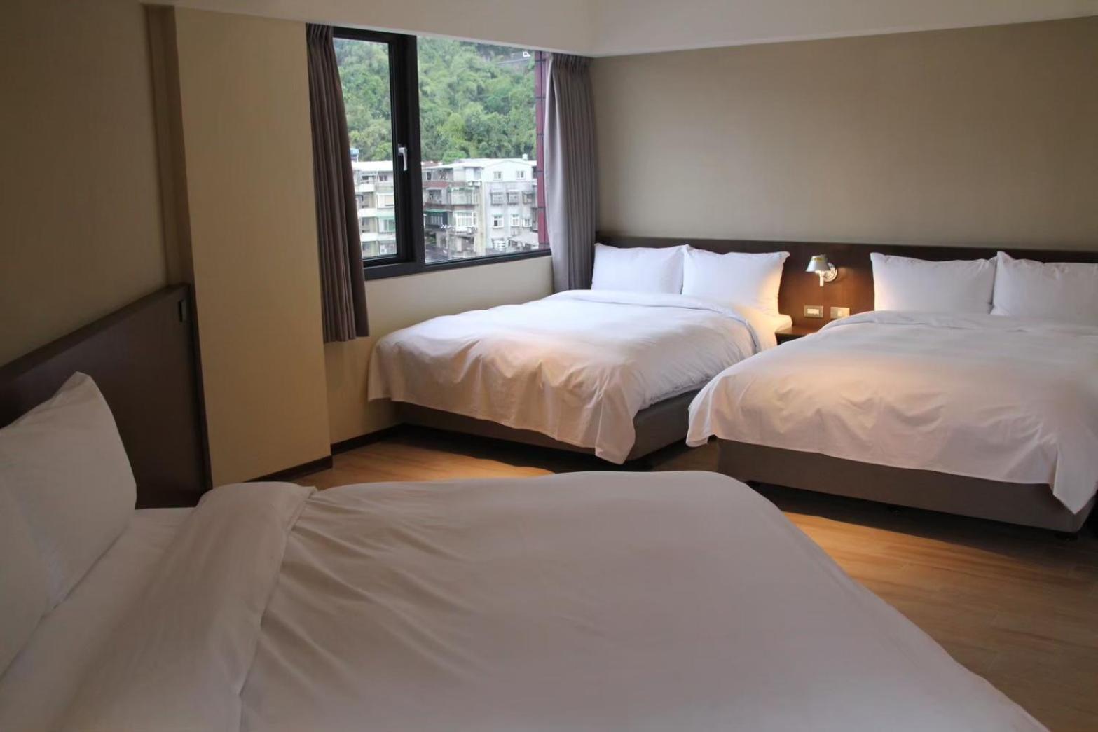 Hotel 享住新大華館 à Keelung Extérieur photo