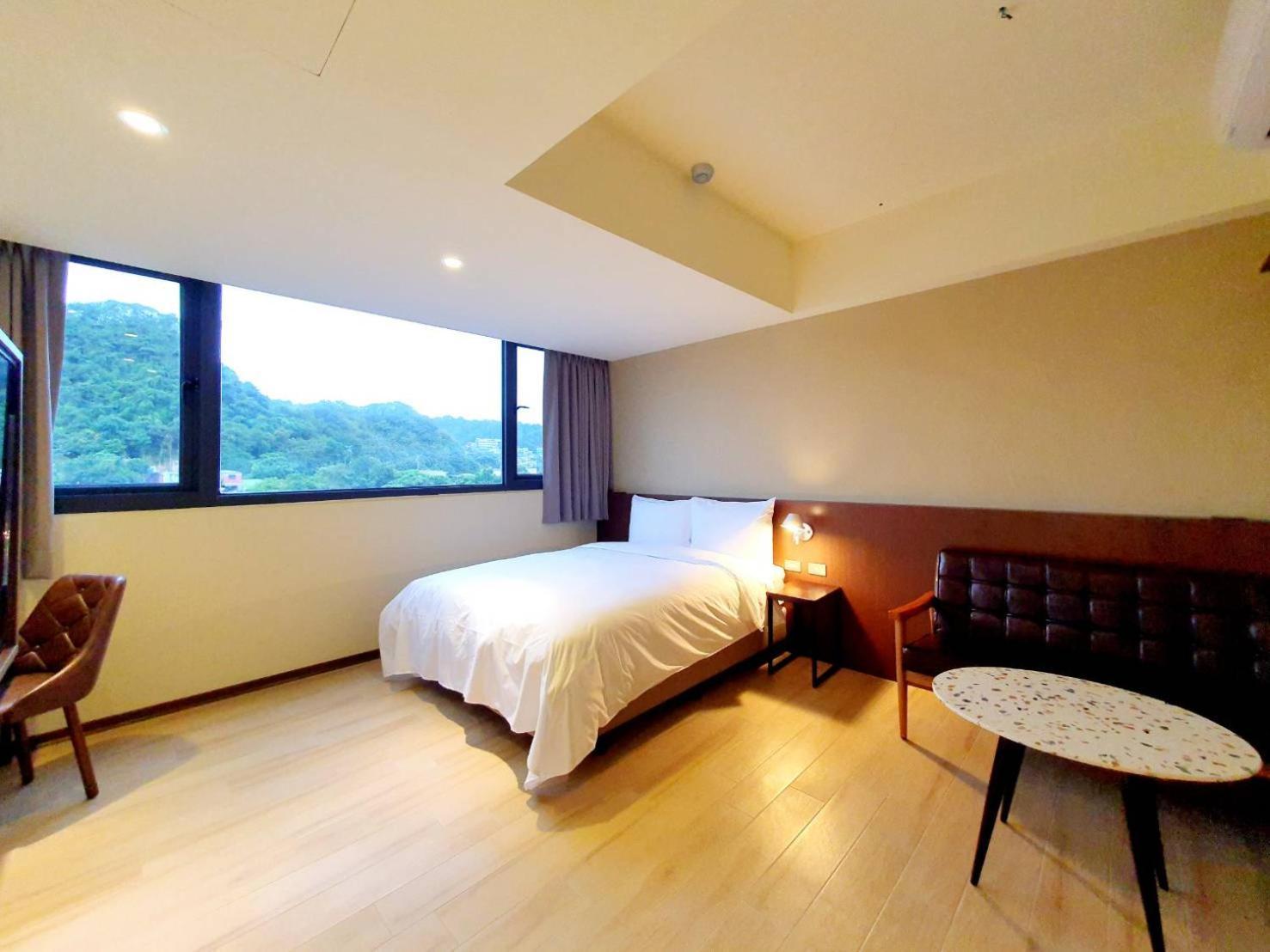 Hotel 享住新大華館 à Keelung Extérieur photo
